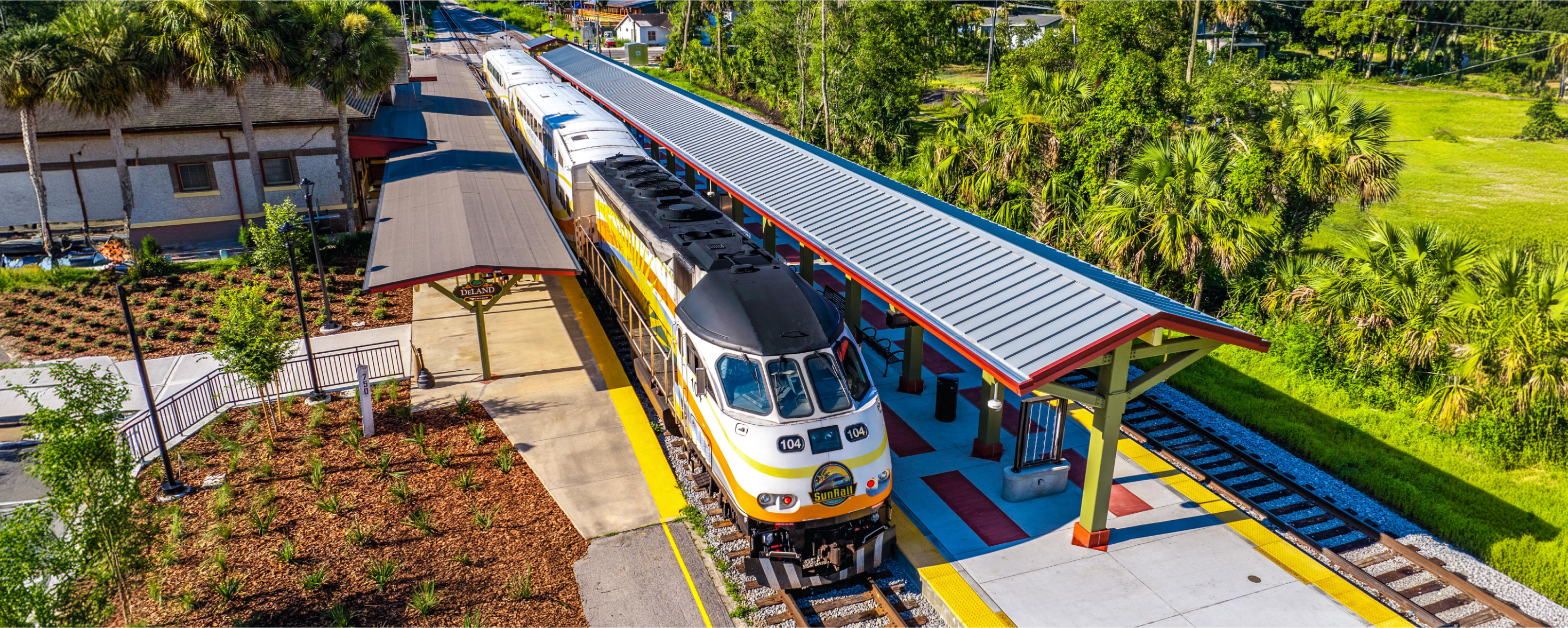 DeLand Station - BIrd's eye view of station with SunRail train at platform.