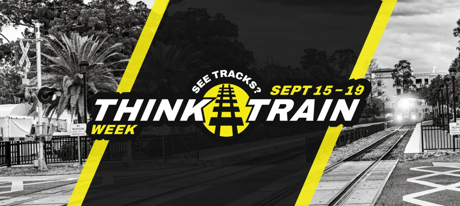 SunRail Train traveling through grade crossing with signal light and gates. See Tracks! Think Train Week - Sept. 15-19