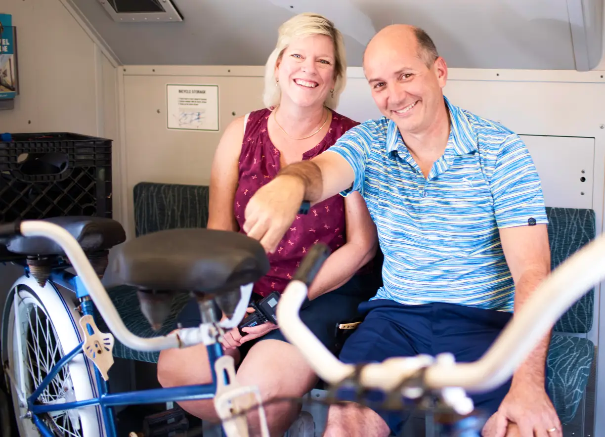 Couple on SunRail with their tandem bike.